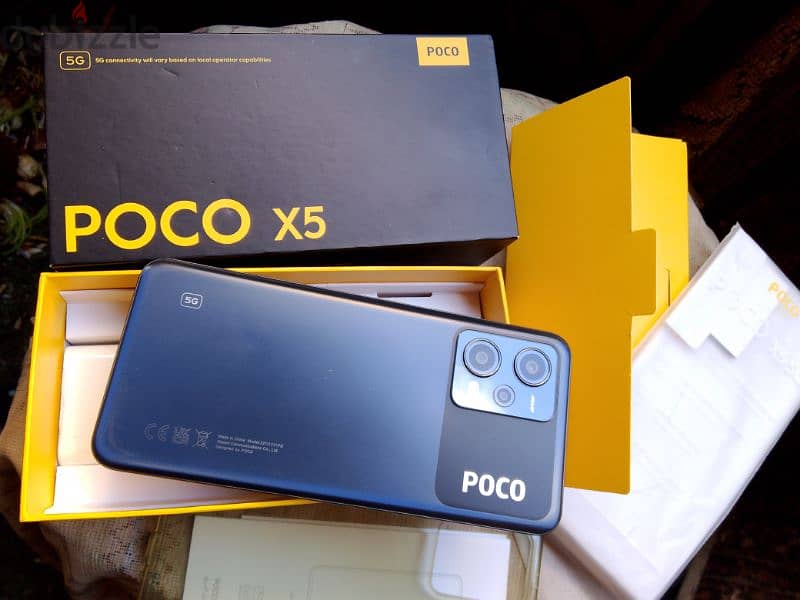 Poco x5 5G معاه كل مشتملاته 3