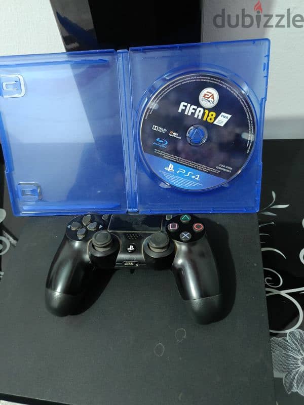 PS4 slim 1 tera Used + video game ( FIFA 2018 ) for free 3