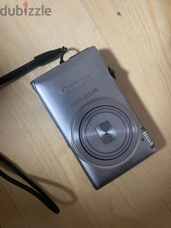 canon ixus 220 معاها البوكس و كل حاجتها 0