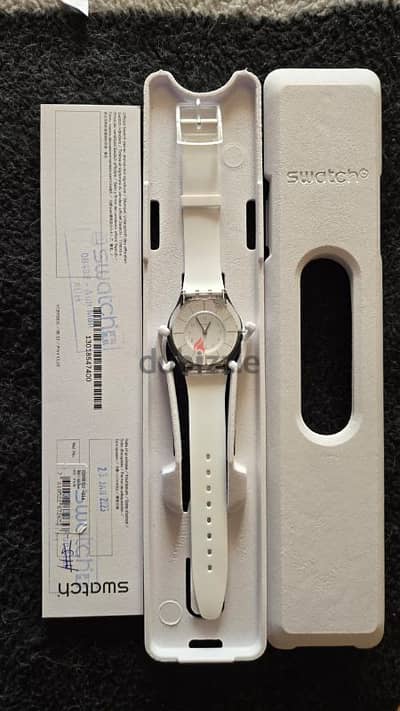 swatch slim watch