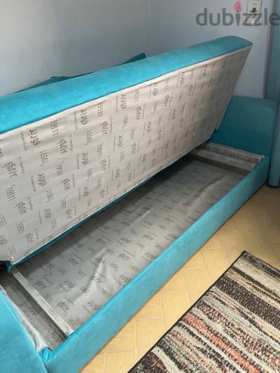 aqua blue sofa bed with storage