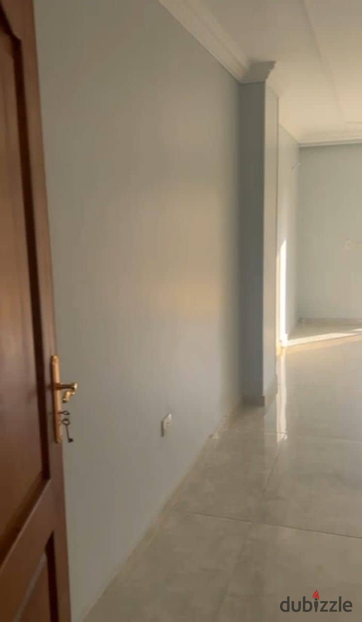 Ground apartment with a large garden in Al Khamayel Compound with a full wooden kitchen  The first tenant 0