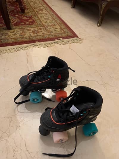 skitting shoes four wheels size 32 and 31