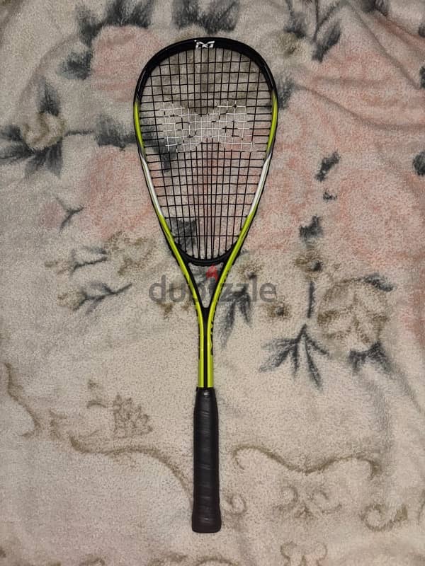 squash racket and original ball 1