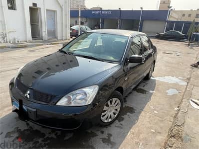 Mitsubishi Lancer 2008  فابريكا دواخل - مانيوال - مالك اول