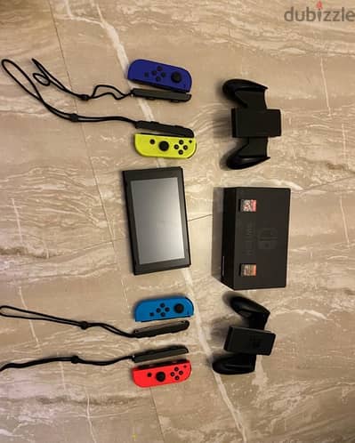 Nintendo Switch 4 Controllers All Accessories 2 Games