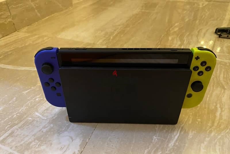 Nintendo Switch 4 Controllers All Accessories 2 Games 7