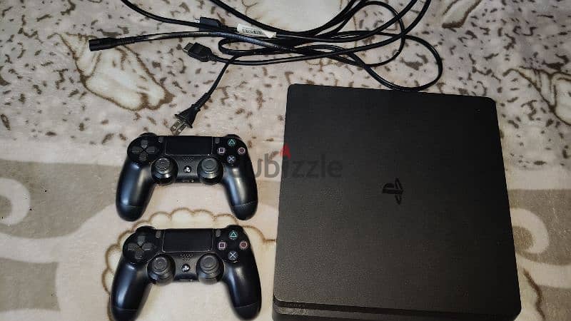 PS4 slim 1tb حاله ممتازه 4