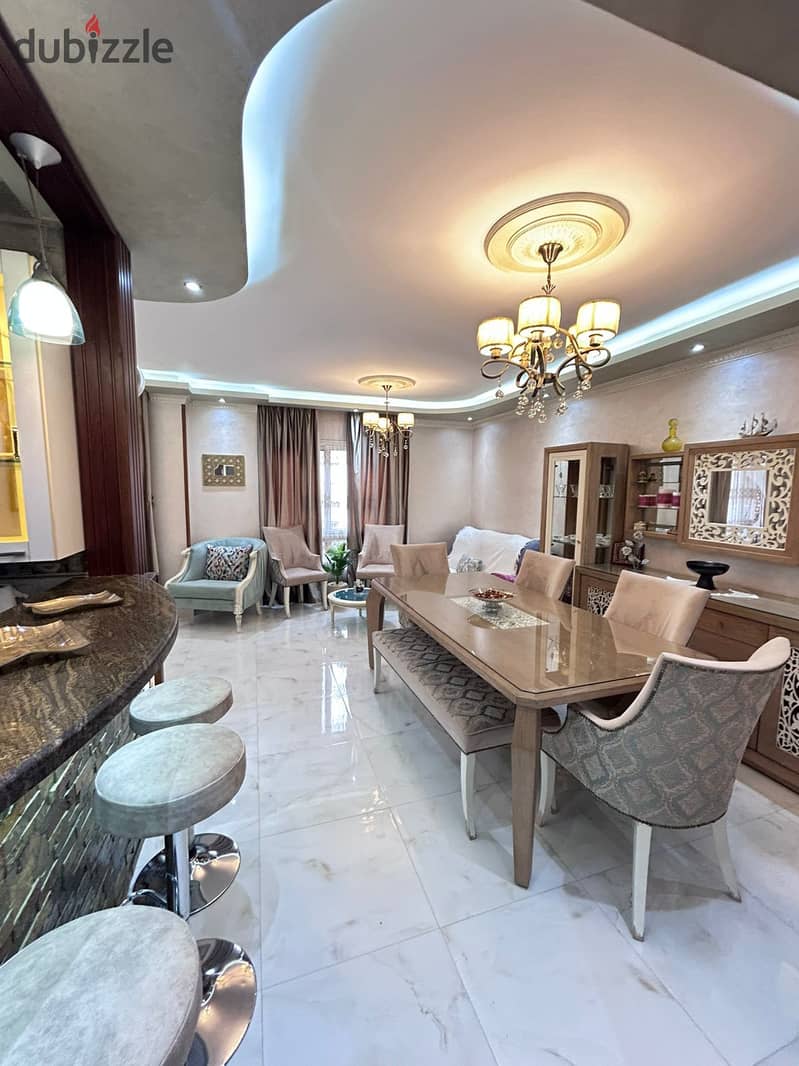 A snapshot apartment for sale with furnishings, appliances and special finishes in Madinaty 0