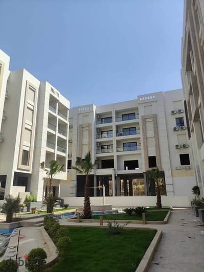 Apartment for sale, fully finished, with kitchen and air conditioners, in Sheraton, directly next to Almaza City Center and minutes from Cairo