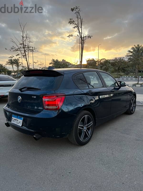 BMW 118 2015 sport اعلي فئة فاتحة سقف بحالة نادرة فابريكا بالكامل 0