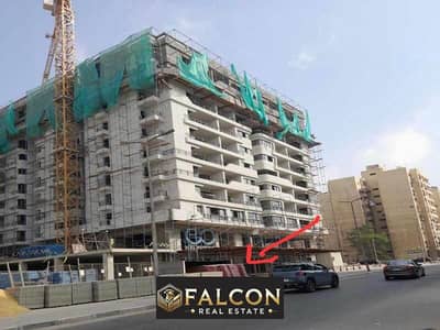 Receive immediately with a 20% down payment, a commercial store in front of City Stars Mall, front facade on El-Nozha Street - Heliopolis