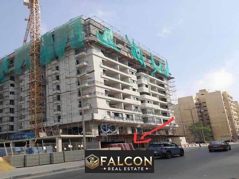 Receive immediately with a 20% down payment, a commercial store in front of City Stars Mall, front facade on El-Nozha Street - Heliopolis 0