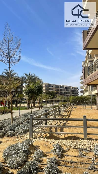 apartment  with garden 170 for sale in compound palm hills new cairo, Prime location  At a bargain price with installment under price market