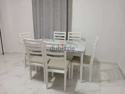 dinning room with 6 chairs