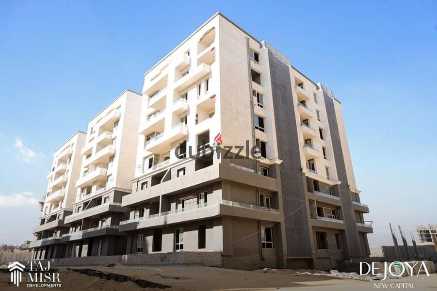 For sale, a 2-room garden apartment with a down payment of 300,000 in New Cairo, on the central axis and two minutes from the Green River 0