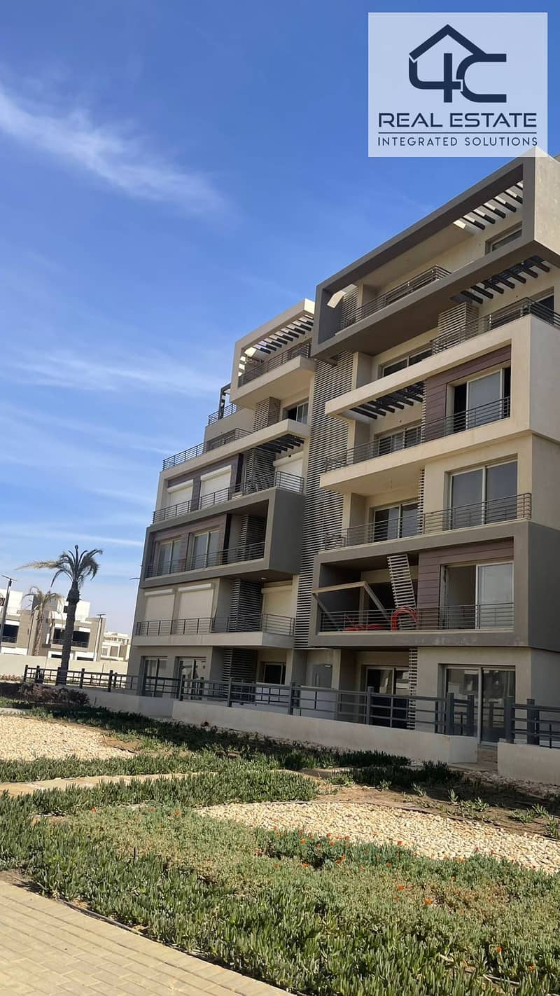 apartment 215 m, 4 bed  for sale in compound palm hills new cairo, ready to move on landscape  with installment  under price market 0