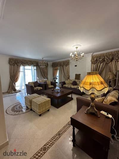 A furnished penthouse for rent with kitchen and air conditioners in Zizinya compound in New Cairo, near the American University.