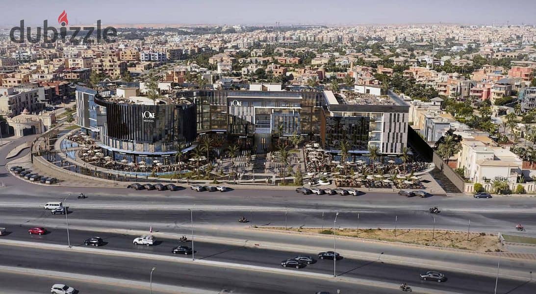 A commercial store for sale in the most powerful investment project in the settlement ( Voke Mall ) in the largest residential complex of villas 0