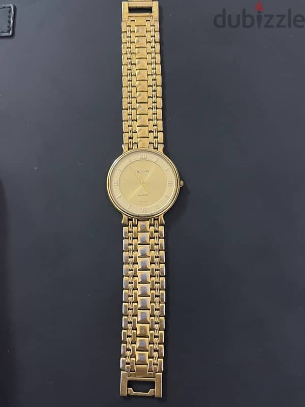 Swiss Made watch ( Nivada) gold plated  22k 0