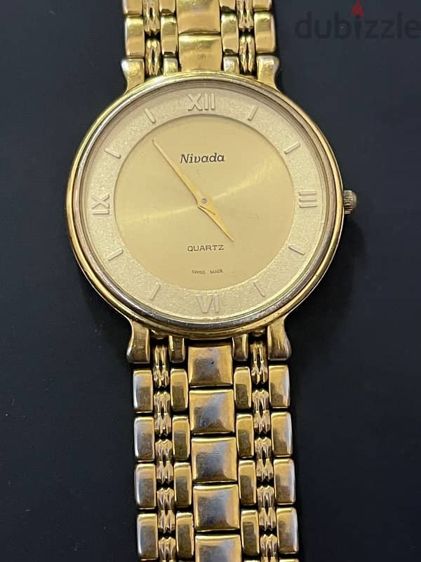 Swiss Made watch ( Nivada) gold plated  22k 1