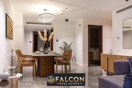 Hotel apartment for sale, fully finished, with hotel services, in Marriott Residence on Suez Road, Sur in Sur, with Almaza City Center