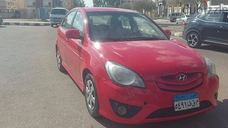 Hyundai new Accent 2011 sport  هيونداى نيو اكسنت سبورت احمر مالبورو 0