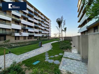 Apartment with a distinctive view for sale in Al Burouj Compound in New Cairo - Wonderful view open to the landscape.