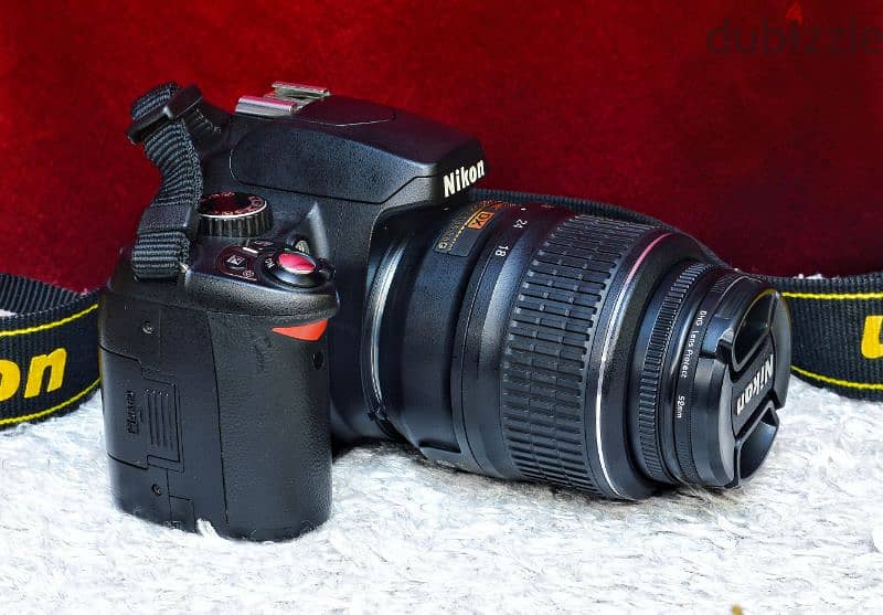 كاميرا نيكون D60 بلينس 55-18 VR + شنطة ظهر نيكون بذراعين 4