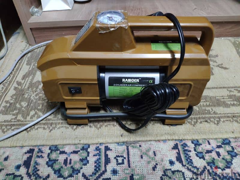 2 cylinder air compressor - منفاخ عجل سيارات بكشاف و شاحن سياره 2