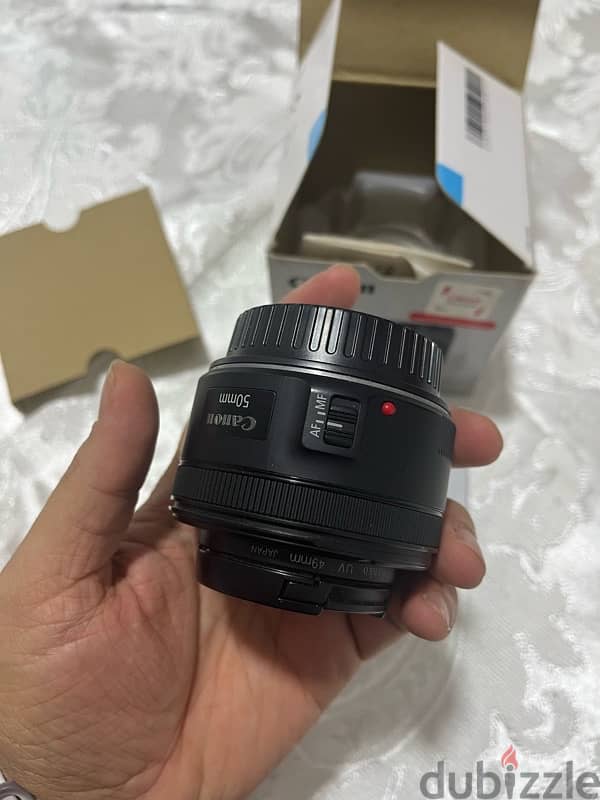 عدسة كانون EF 50mm f/1.8 STM بحالة  جديده 2