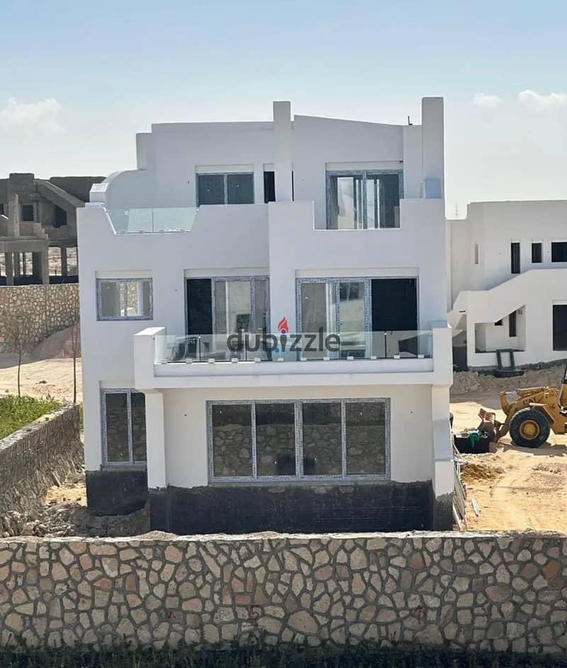 Villa with Lagoon View for sale, fully finished, in the North Coast, Ras El Hekma, with installments over 10 years 0