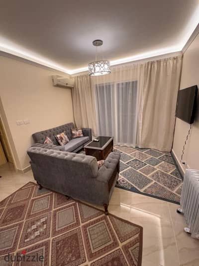 Furnished opportunity for rent in Madinaty, 78 sqm apartment in B12, first fully air-conditioned residence, at a price suitable for a cat, wide steps