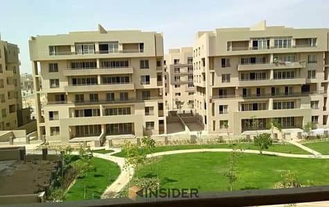 apartment with garden Facing north at the square by al ahly sabbour