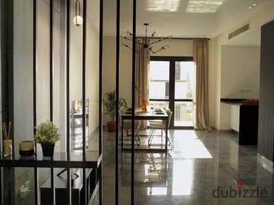 Apartment for sale in Westown Compound - Sodic Sheikh Zayed, ultra modern finishing, with air conditioners and kitchen