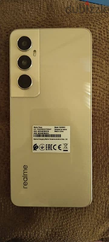 Realme C65 Gold 4