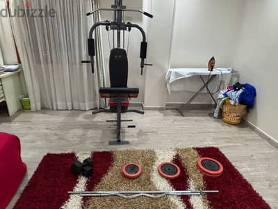 Full body Gym machine with dumbles, bars and weights