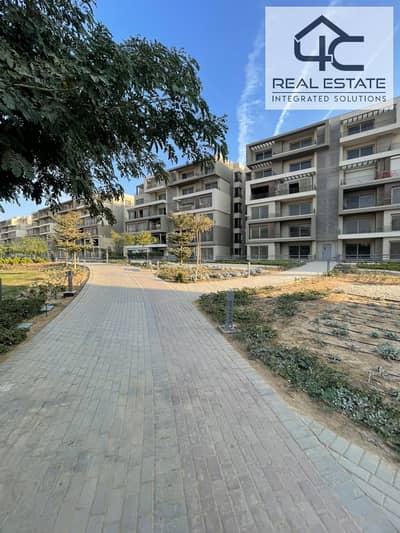 Ready to move apartment with garden corner 4 bedrooms master in prime location Landscape view for sale in Palm Hills New Cairo