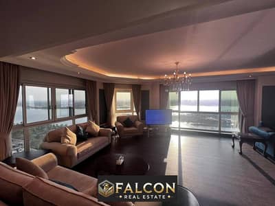 For sale, a hotel suite for the price of an apartment, with a clear view of the Maadi Nile Corniche, with a guaranteed rental return, fully finished