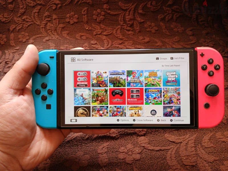 Nintendo Switch Oled معدل مليان ألعاب 0