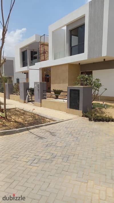 Town house middle in Zed East By Ora New Cairo Fully finished with air conditioners