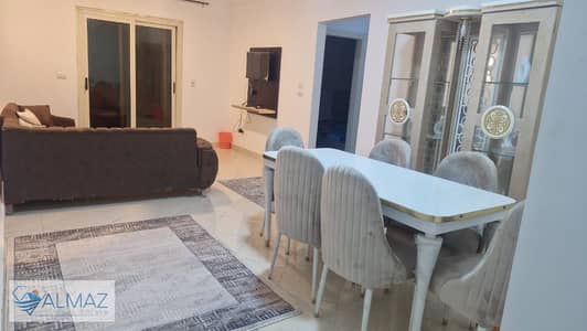 Furnished apartment for rent with air conditioners in Gardenia City Compound with elevator in Nasr City