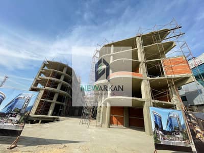 Company headquarters for sale, delivery soon, with a low down payment, in a very prime location near Arkan, Sheikh Zayed