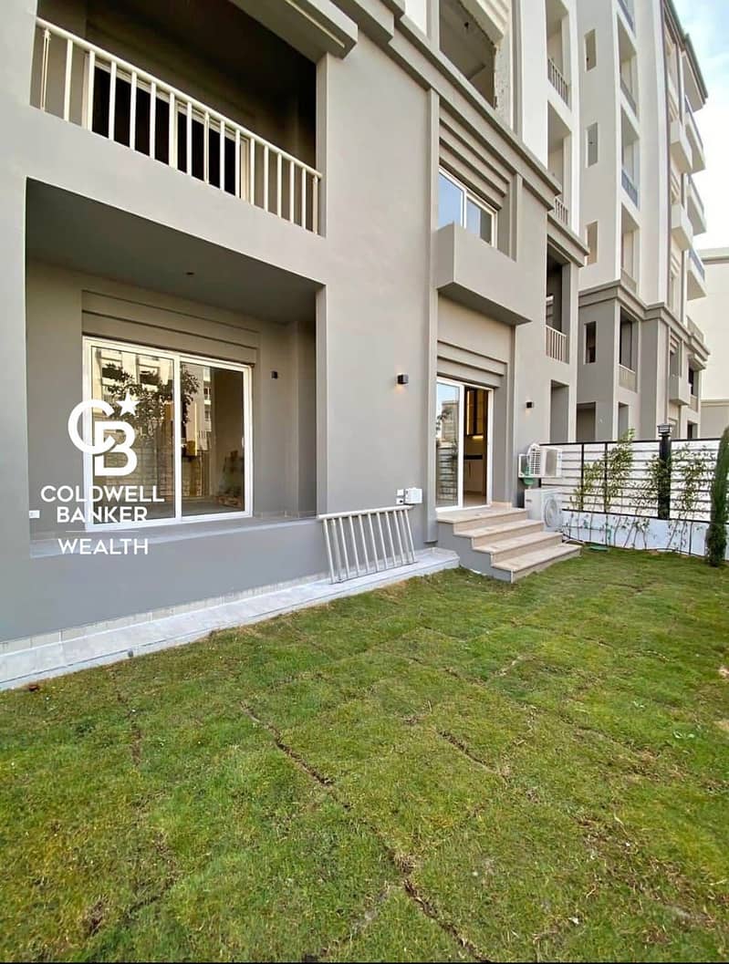 A fully finished 2BR apartment with a garden for sale in New Cairo on Al-Teseen Street in Hyde Park Compound, just minutes from the AUC. 0