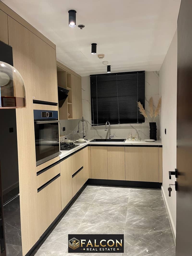 Apartment for sale, fully finished, with furniture, appliances and air conditioners, with hotel services and the highest annual return, in Marriott 0