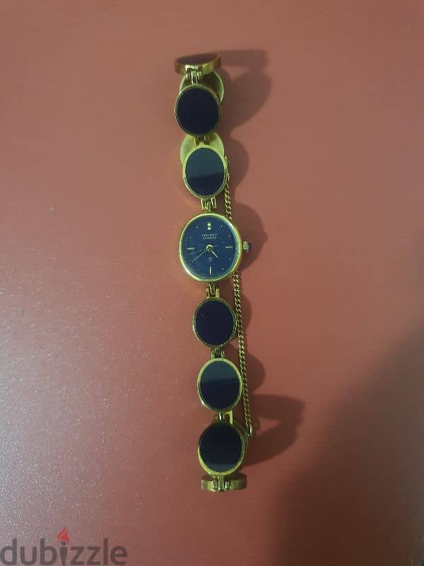 vintage orient gold tone black stone watch and bracelet 1