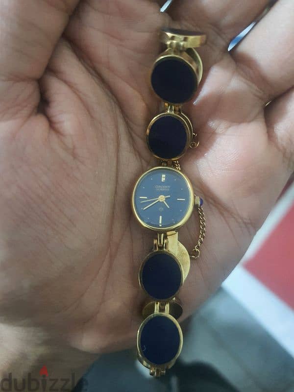 vintage orient gold tone black stone watch and bracelet 2