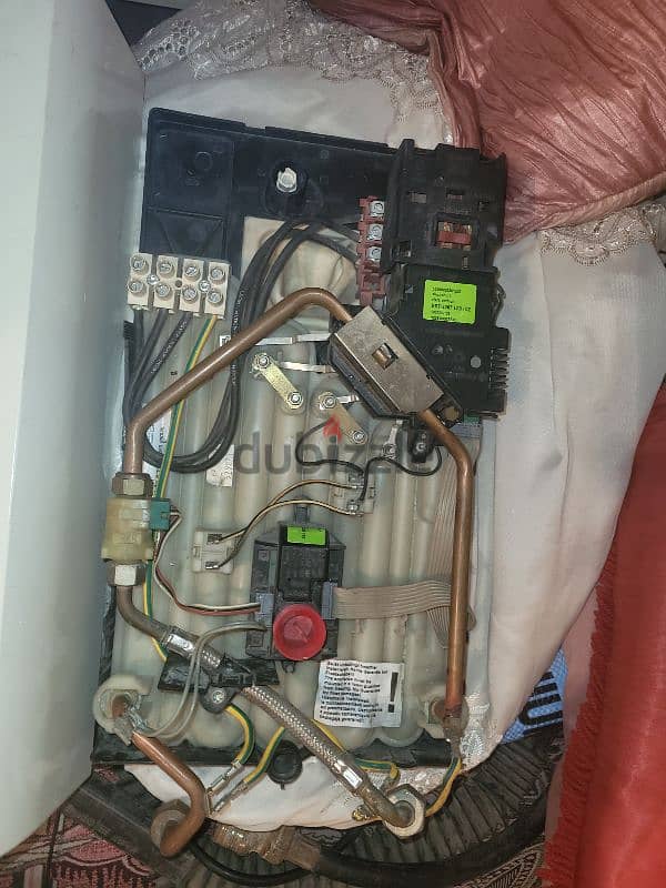 repair tankless water heater صيانه سخان مياه فوري  وكذالك الدفايات 5