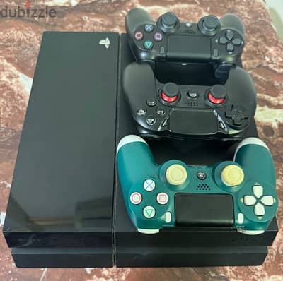 PS4 1 tb with 7 games and 3 controllers