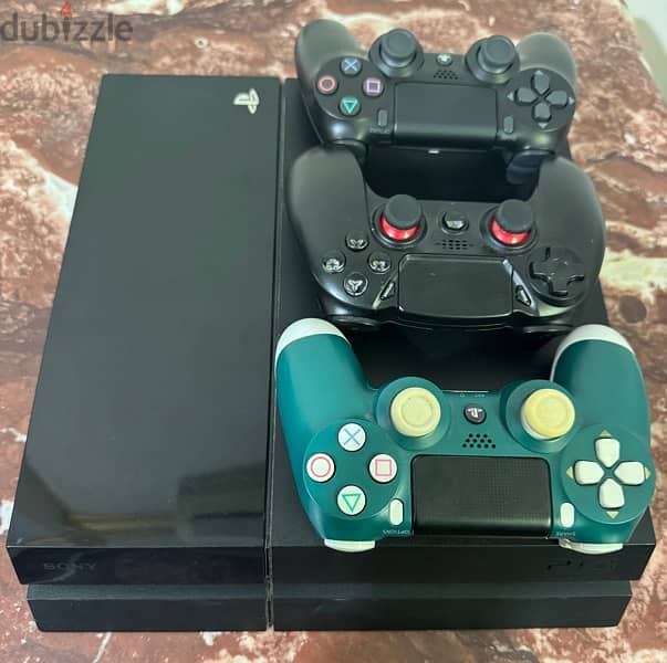 PS4 1 tb with 7 games and 3 controllers 0